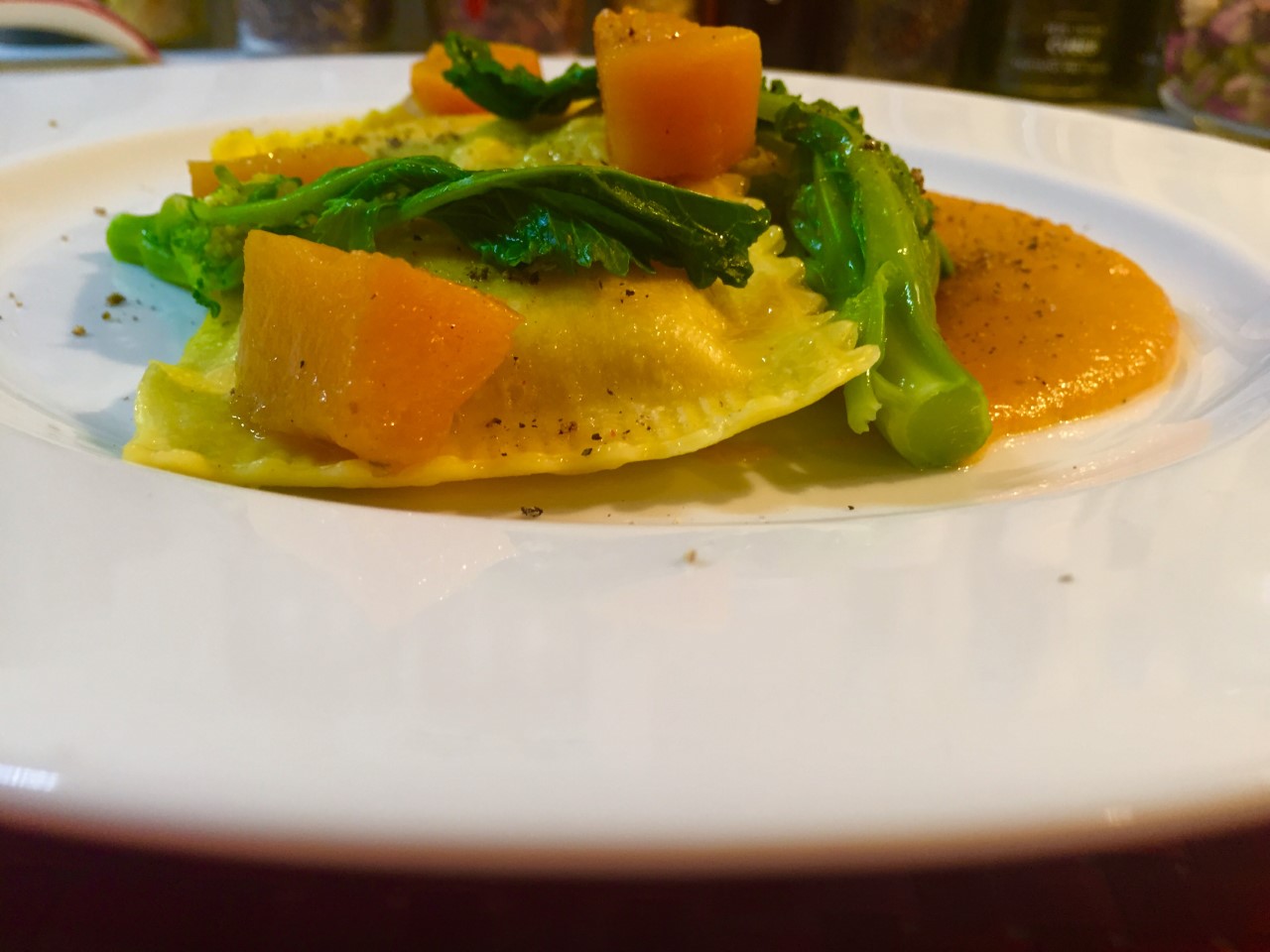 Tortelli alla zucca con zucca in crema e cime di rapa